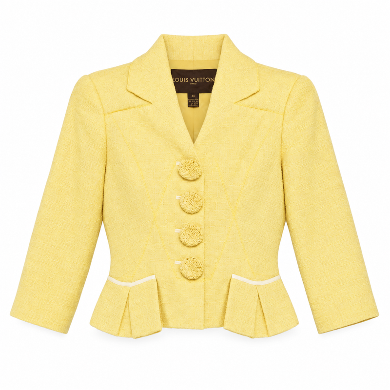 Louis Vuitton pale yellow tweed cropped blazer with notched lapels, three-quarter sleeves, covered front buttons and structured peplum-style pocket detailing.