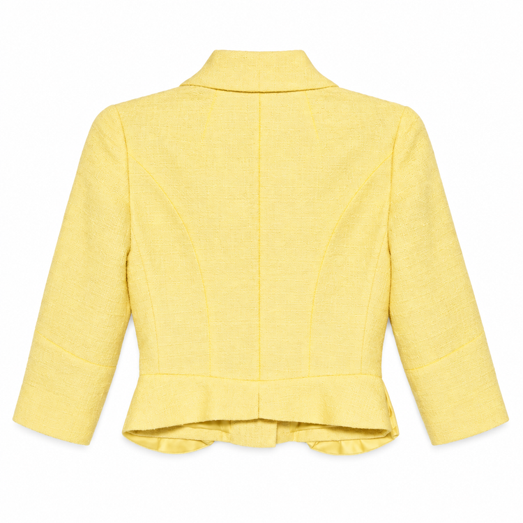 Louis Vuitton pale yellow tweed cropped blazer with notched lapels, three-quarter sleeves, covered front buttons and structured peplum-style pocket detailing.