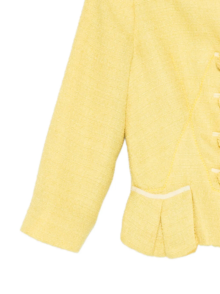 Louis Vuitton tweed cropped blazer, stylish tailored jacket with structured fit and classic pattern, ideal for sophisticated looks.