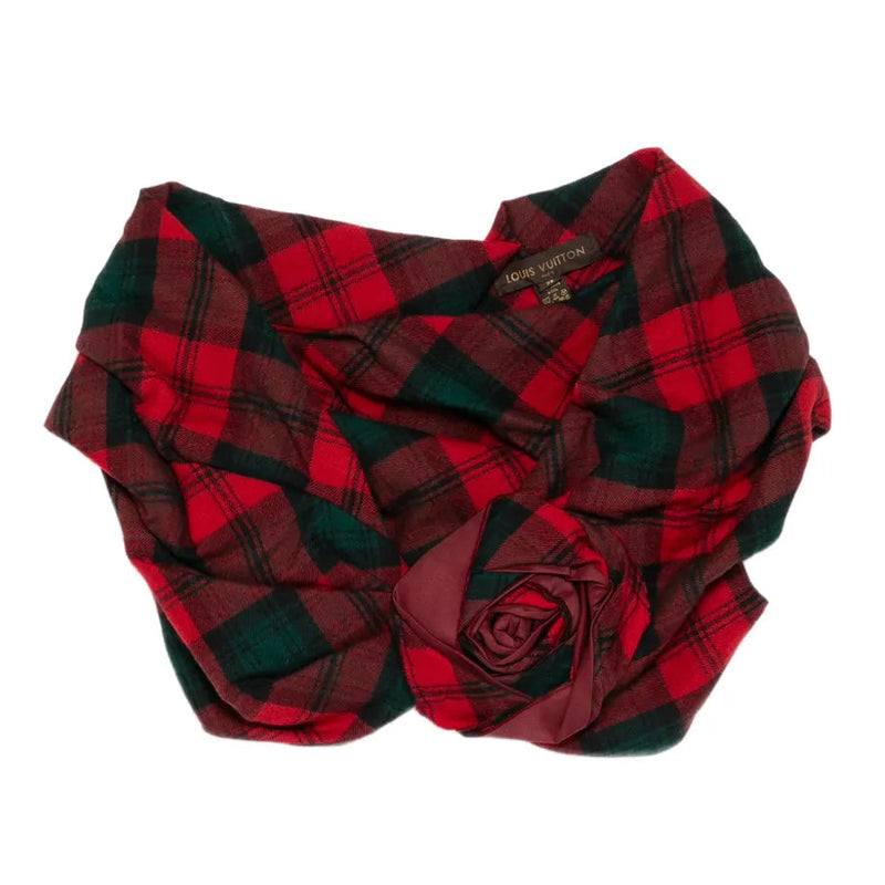 Louis Vuitton Fall 2004 tartan mini cape with oversized rosette in red, burgundy and deep green plaid, shown as a Marc Jacobs runway piece.