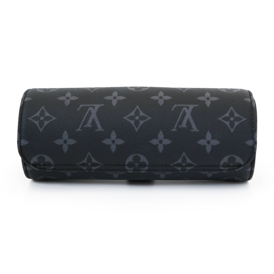 Louis Vuitton watch pouch wallet, elegant leather case with zipper closure for storing and protecting watches.