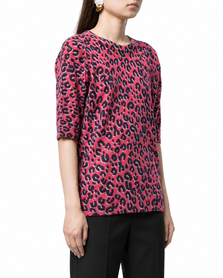 Louis Vuitton x Stephen Sprouse 2006 leopard print jumper in red, pink and black with round neckline, elbow-length sleeves and relaxed longline fit.