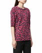 Louis Vuitton x Stephen Sprouse 2006 leopard print jumper in red, pink and black with round neckline, elbow-length sleeves and relaxed longline fit.