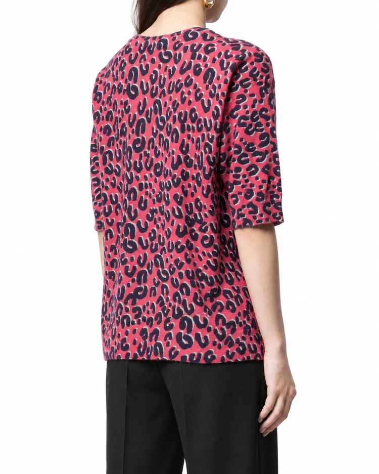 Louis Vuitton x Stephen Sprouse 2006 leopard print jumper in red, pink and black with round neckline, elbow-length sleeves and relaxed longline fit.