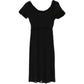 Pre-owned MARC JACOBS VINTAGE boat neck crepe dress displayed on a hanger, showcasing its elegant design and classic style.
