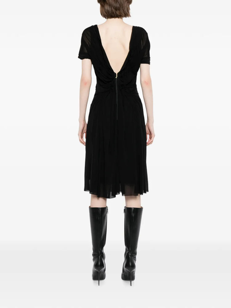 Pre-owned MARC JACOBS VINTAGE boat neck crepe dress displayed on a hanger, showcasing its classic design and elegant fabric.