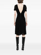 Pre-owned MARC JACOBS VINTAGE boat neck crepe dress displayed on a hanger, showcasing its classic design and elegant fabric.