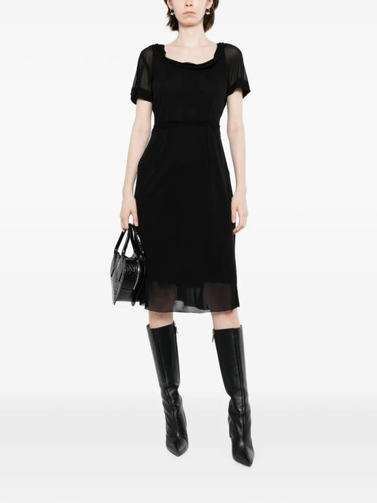 Black crepe boat neck dress by Other Designers featuring a classic silhouette and elegant boat neckline.