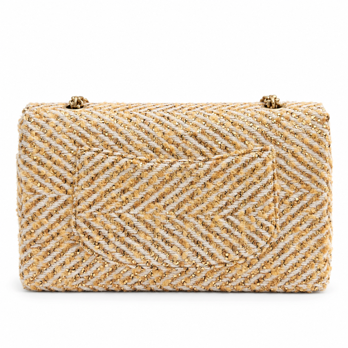 Chanel medium gold tweed shoulder bag with a single flap and chain strap, showcasing elegant texture and classic design.