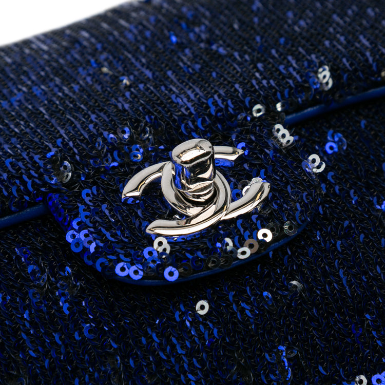 Chanel medium sequin shoulder bag with a single flap, featuring shimmering sequins and elegant chain strap detail.
