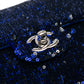 Chanel medium sequin shoulder bag with a single flap, featuring shimmering sequins and elegant chain strap detail.