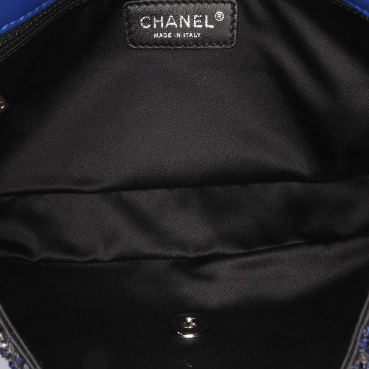 Chanel medium sequin shoulder bag with single flap and chain strap, sparkling sequins on black fabric for elegant style.