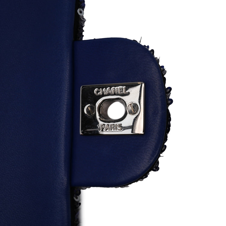 Chanel medium sequin shoulder bag with single flap and chain strap, sparkling and stylish for evening wear.