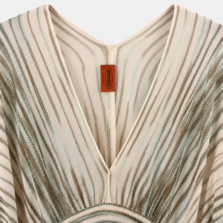 Missoni beige striped knit kaftan mini dress with deep V-neckline, batwing sleeves, fitted waistband, gathered front detail, self-tie back belt, and pale blue and brown stripe pattern.