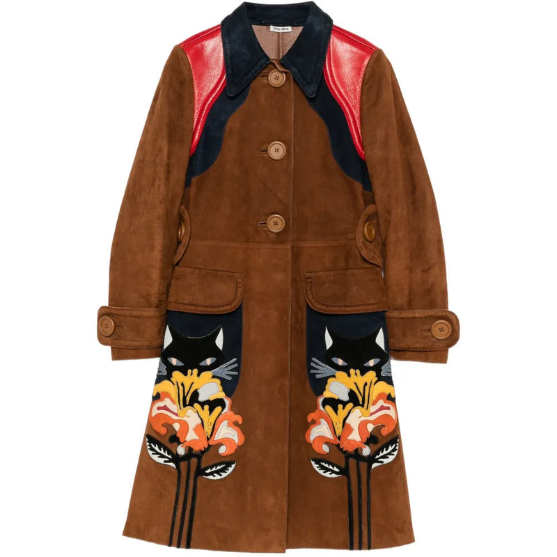 Brown suede coat by Miu Miu featuring playful flower and cat patch embellishments on the front.