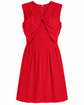 Red sleeveless dress by Miu Miu featuring bow detailing, elegant fit, and stylish design.