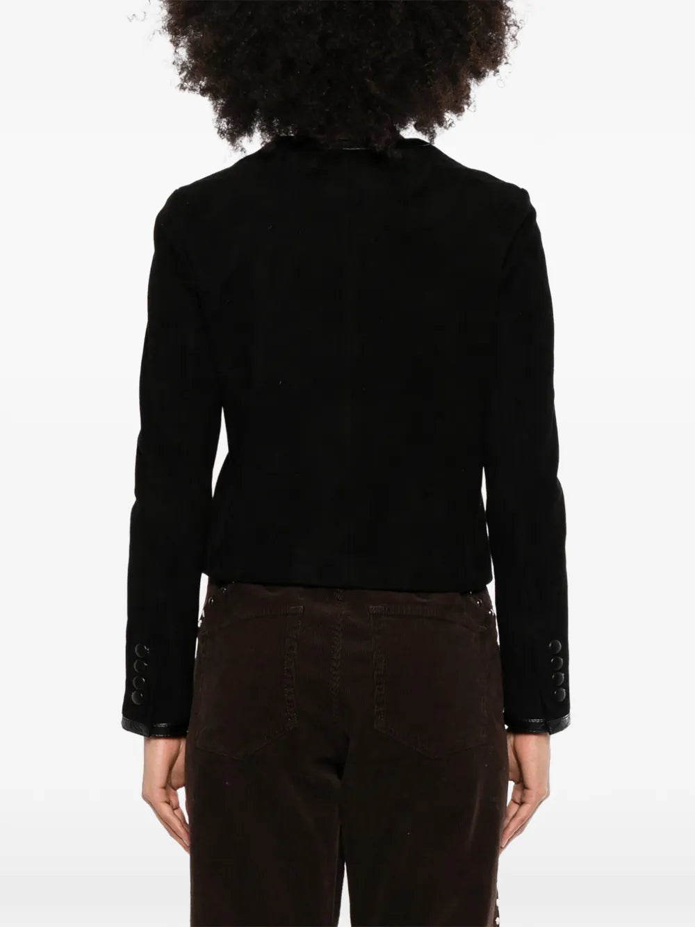 Celine suede cropped jacket displayed on a hanger, showcasing its stylish design and textured material.