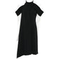 Black Thierry Mugler dress with orange accent details, showcasing a sleek design and elegant silhouette.