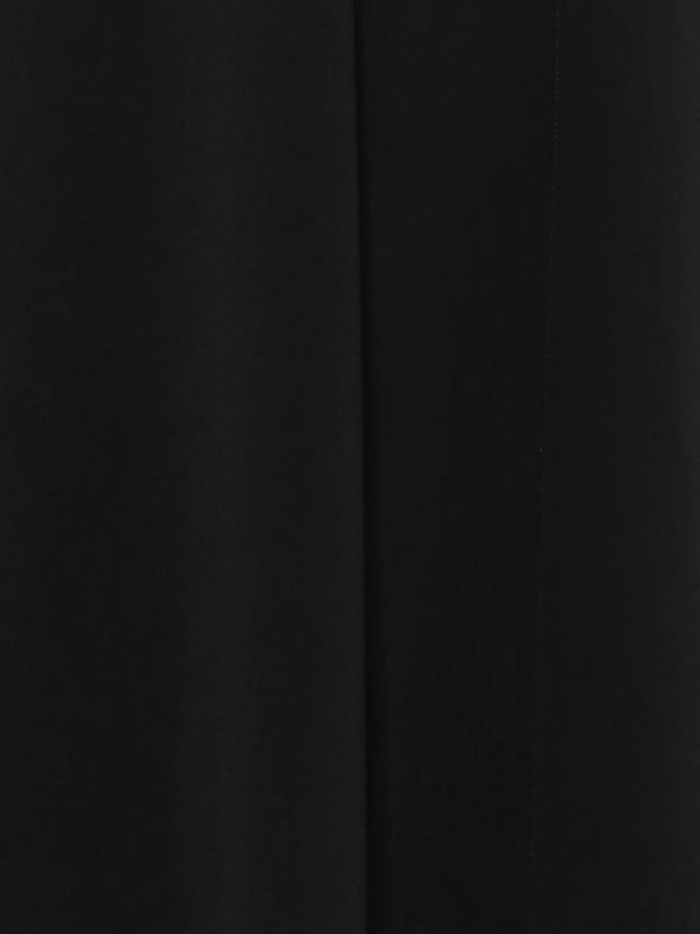 Black Thierry Mugler dress with orange accent details, elegant and stylish, showcasing a fitted silhouette with bold color contrast.