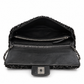 Open Chanel sequin east-west flap shoulder bag showing black interior lining and sleek design.