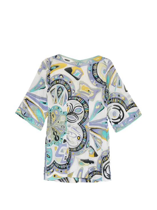 Emilio Pucci blue abstract print dress featuring a relaxed tunic style, flowing fabric, and vibrant artistic design.