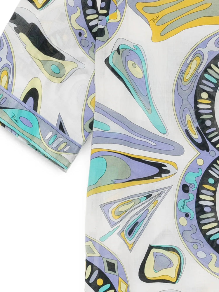 Pre-owned PUCCI blue dress displayed on a hanger, showcasing vibrant fabric and stylish design.