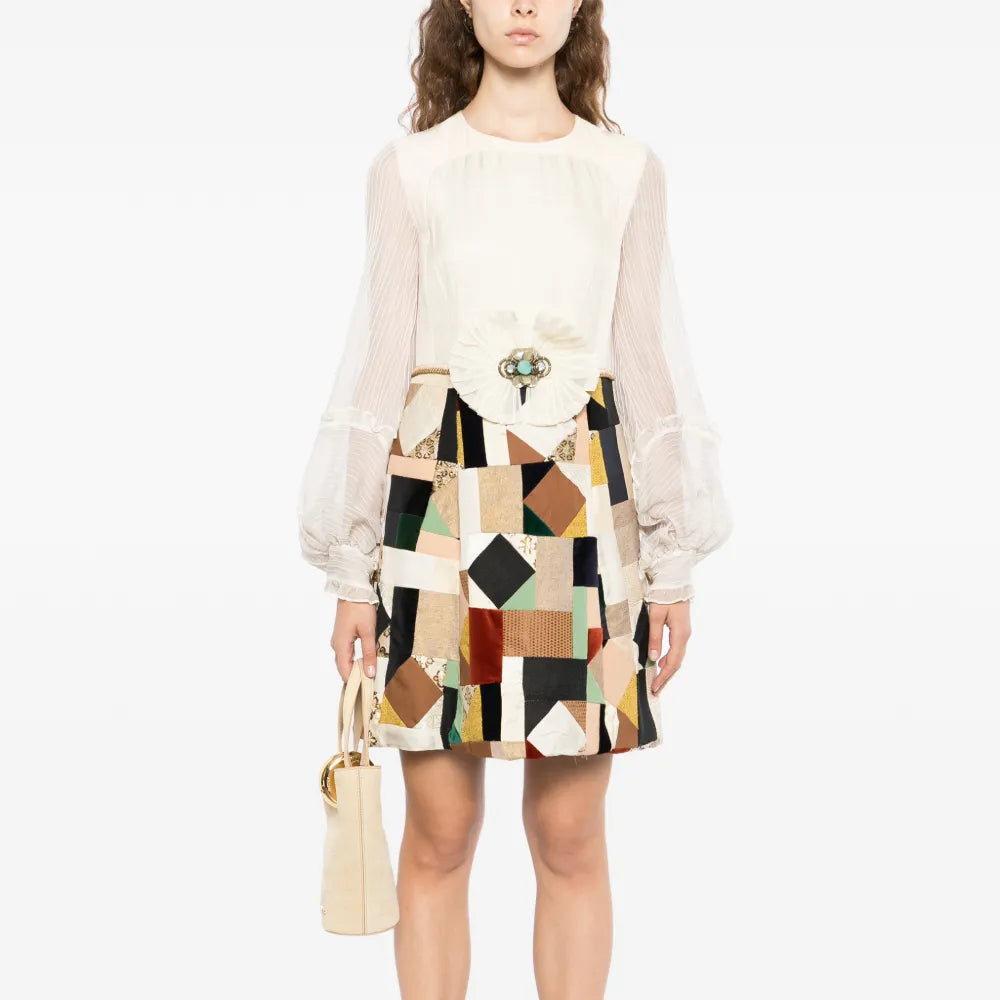Chloé patchwork ruffled chiffon sleeve midi dress with layered design and flowing fabric, perfect for elegant occasions.