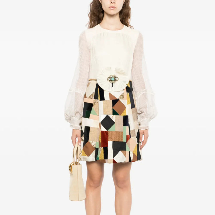 Chloé patchwork ruffled chiffon sleeve midi dress with layered design and flowing fabric, perfect for elegant occasions.
