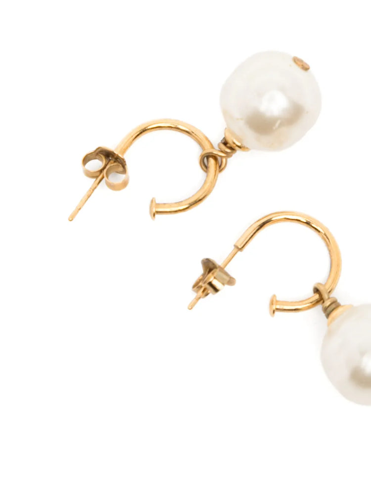 Pair of Chanel gold-tone hoop drop earrings featuring round cream faux pearls embellished with a small gold CC logo accent.