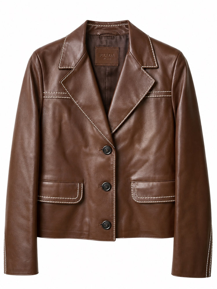 Prada brown leather jacket with topstitch trim, front view showcasing tailored blazer style and sleek design.