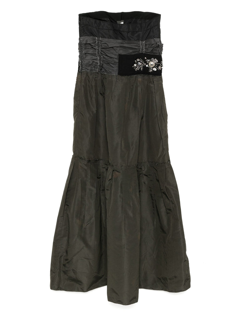 Prada 2006 bead-embellished dress with intricate beadwork and elegant design, displayed on a mannequin.