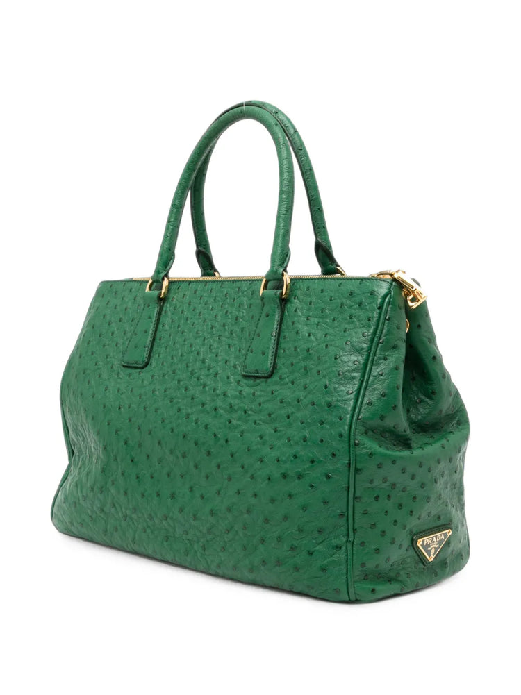 Prada Double Zip Galleria handbag featuring sleek tote design with dual zip closures and elegant leather finish.
