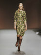 Prada fall 2003 pink and green floral dress with long sleeves and a fitted waist, displayed on a hanger.