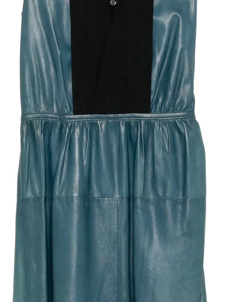 Prada teal leather dress with sleek design and fitted silhouette, showcased on a model.
