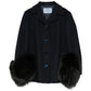 Prada wool blazer with a statement cuff, featuring a tailored fit and stylish design, ideal for sophisticated outerwear.
