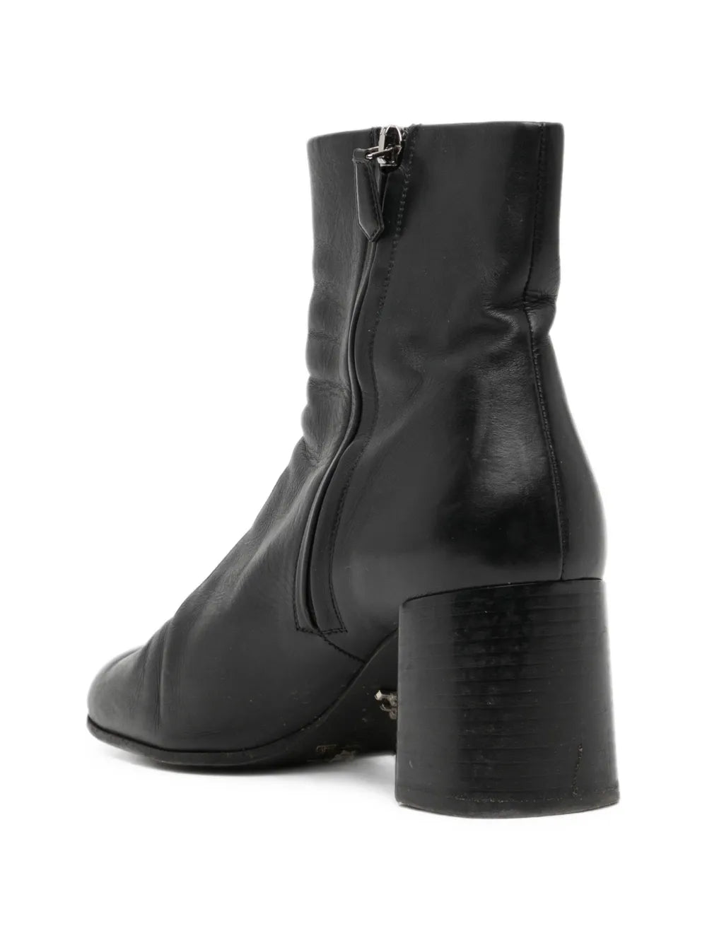 Black Prada ankle boots with sleek leather design and subtle heel, stylish shoes for versatile everyday wear.