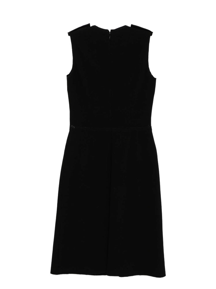 Black Prada sleeveless wool dress hanging on a wooden hanger, showcasing a sleek, elegant design with a fitted silhouette.