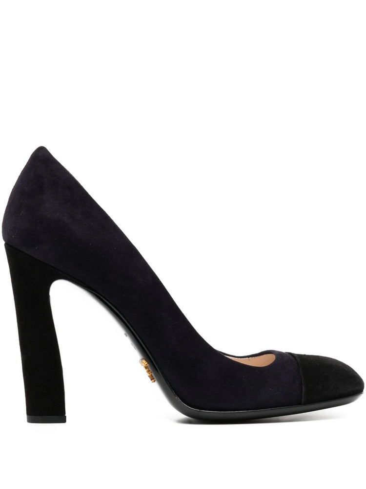 Prada black suede square toe pumps with sleek design and pointed heels, showcasing elegant footwear for women.