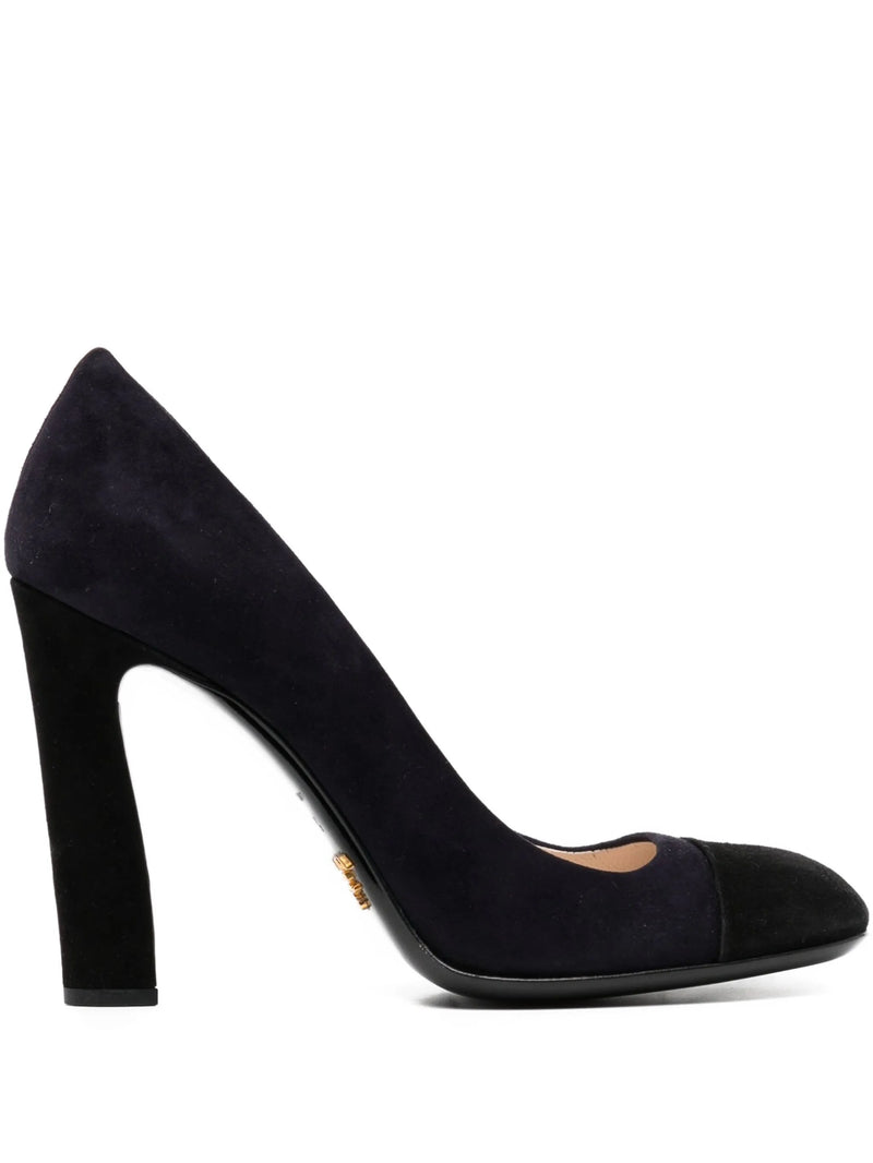 Prada black suede square toe pumps with sleek design and pointed heels, showcasing elegant footwear for women.