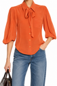 Prada coral silk shirt, stylish tops with smooth fabric and elegant design, displayed on a flat surface.