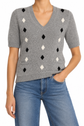 Prada grey short-sleeve knit top with a fitted design, featuring a round neckline and textured fabric, casual stylish women’s top.