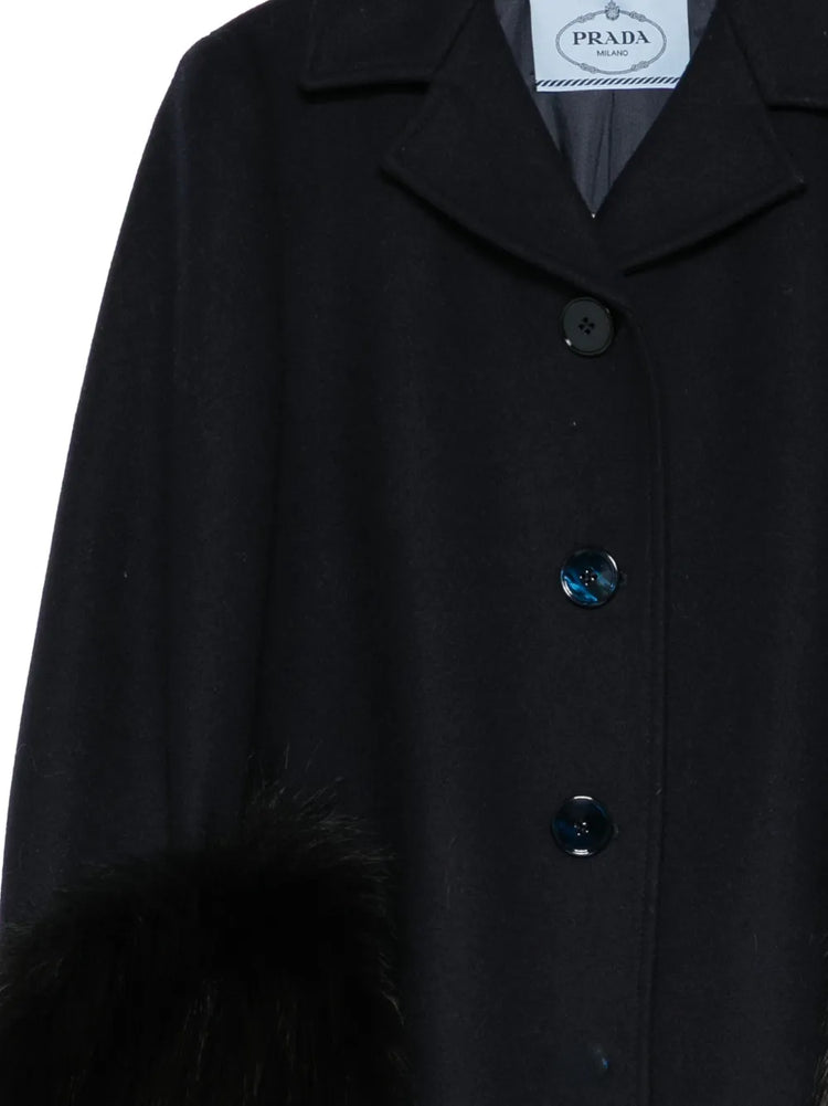 Navy Prada wool jacket with statement cuff, stylish blazer featuring tailored fit and elegant design.
