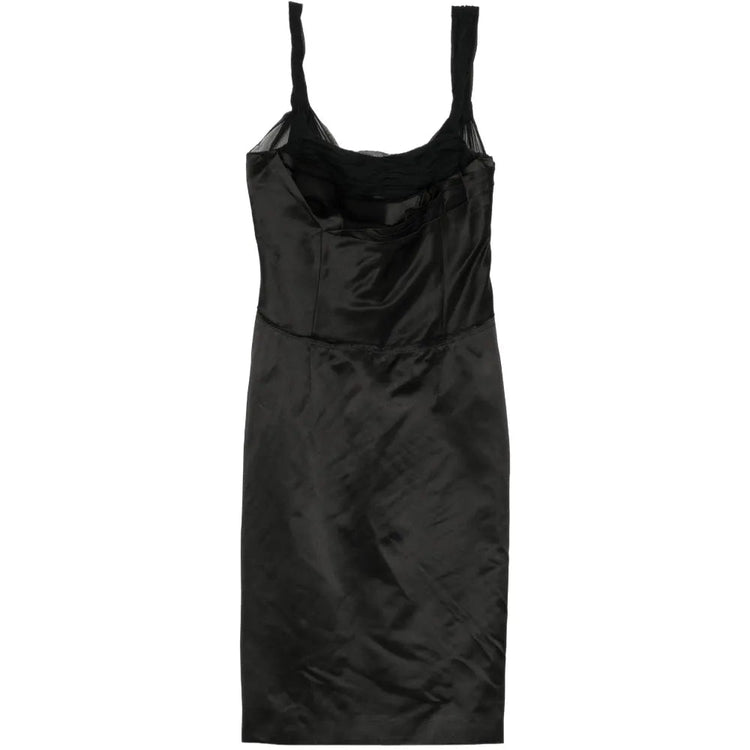 Prada structured bodice dress featuring tailored fit and elegant design, showcased on a model in a fashion photoshoot.