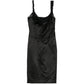 Prada structured bodice dress featuring tailored fit and elegant design, showcased on a model in a fashion photoshoot.