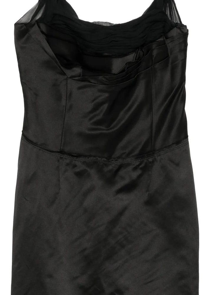 Prada structured bodice dress with tailored fit and elegant design, showcased on a mannequin in a fashion photoshoot.