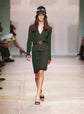 Prada Spring 2005 Look 13 green and red crochet cardigan coat with long sleeves, open-knit texture, front embellishment, longline silhouette and runway archive design.