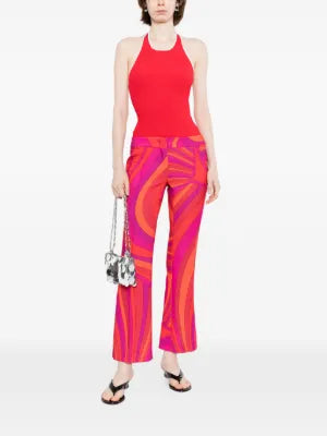 Emilio Pucci printed cady straight-leg trousers displayed on a model, showcasing vibrant patterns and tailored fit.