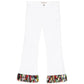 Pre-owned PUCCI fringed straight-leg jeans with distressed details and classic denim wash, displayed on a hanger.