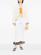 Pre-owned PUCCI fringed straight leg jeans showing distressed denim and fringe details on a white background.