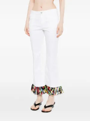 Pre-owned PUCCI fringed straight leg jeans showing distressed denim and fringe details on the hem.
